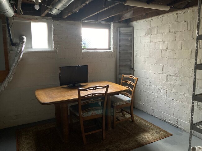 Laundry Room w/ folding table - 1035 Newton Ave
