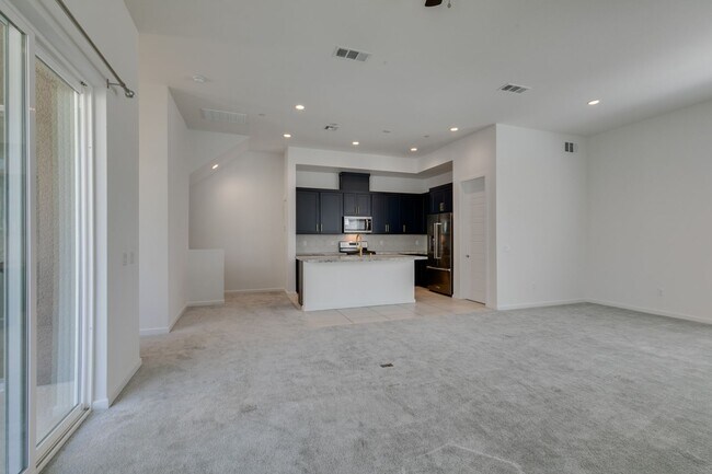 Building Photo - Stunning 4-Level Townhome in Inspirada | R...