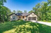 Building Photo - Nearly New Bella Vista Home Nestled in Ultimate Privacy! Furnished options available!