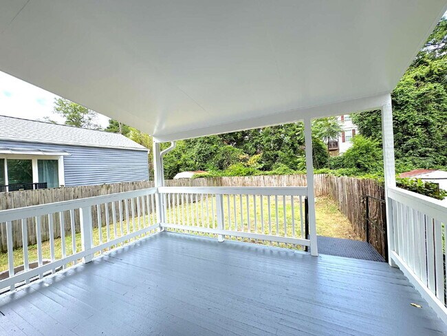 Building Photo - Charming 2BR Townhome with Finished Basement, Fenced Yard & Private Driveway Near Huntington Metro