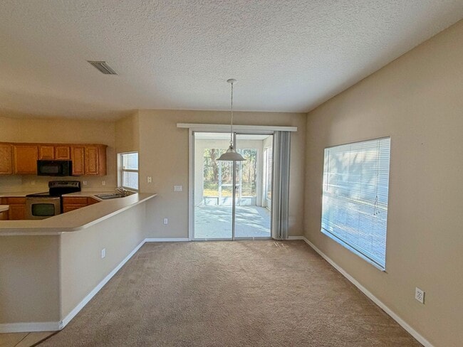 Building Photo - Spacious 3-bedroom, 2-bathroom home offering 2,362 square feet of living space with a desirable o...