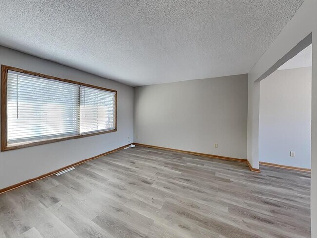 Building Photo - 11051 Quebec Ave N