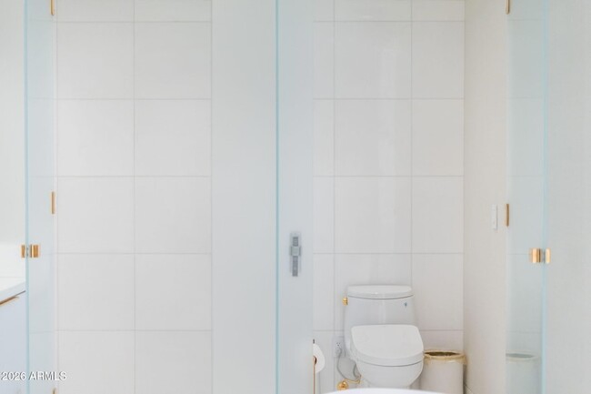 Building Photo - 6587 N Palmeraie Blvd