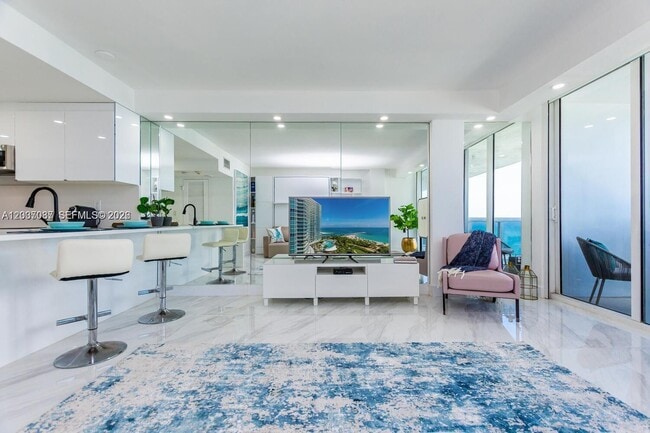 Building Photo - 10275 Collins Ave