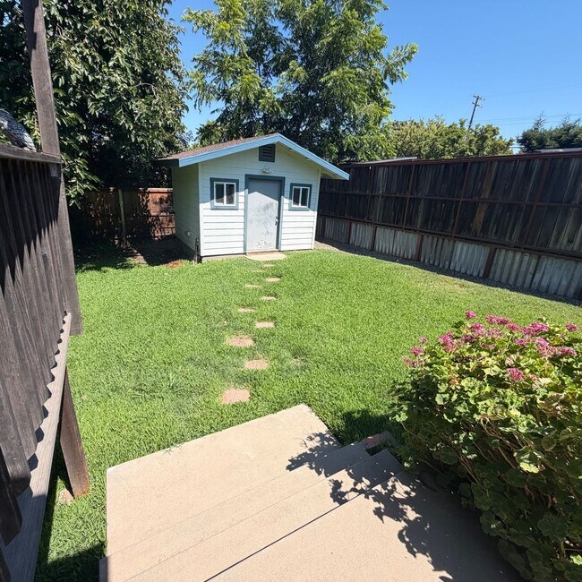 Building Photo - Adorable house with large deck,  yard and RV access
