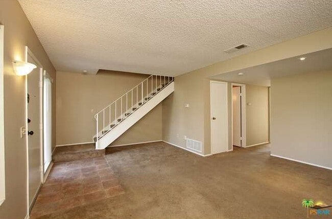 Building Photo - Spacious 4-Bedroom Condo in Indian Canyon ...