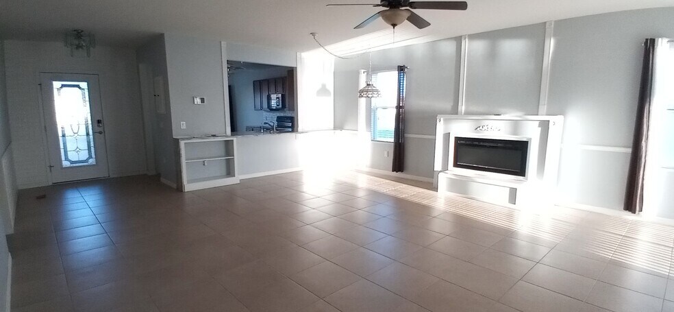 Building Photo - Coming Soon: Charming and Cozy 3 bedroom / 2 bathroom Home with 2 Car Garage, Lake View in Gated ...