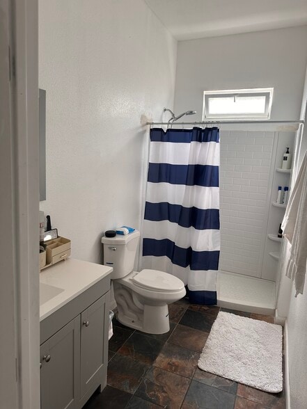 • Large private bathroom with full-size sink and oversized shower - 8333 Painter Ave
