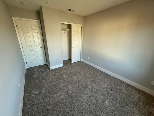 Building Photo - NEW PHOTOS! Two-level home located in Coff...