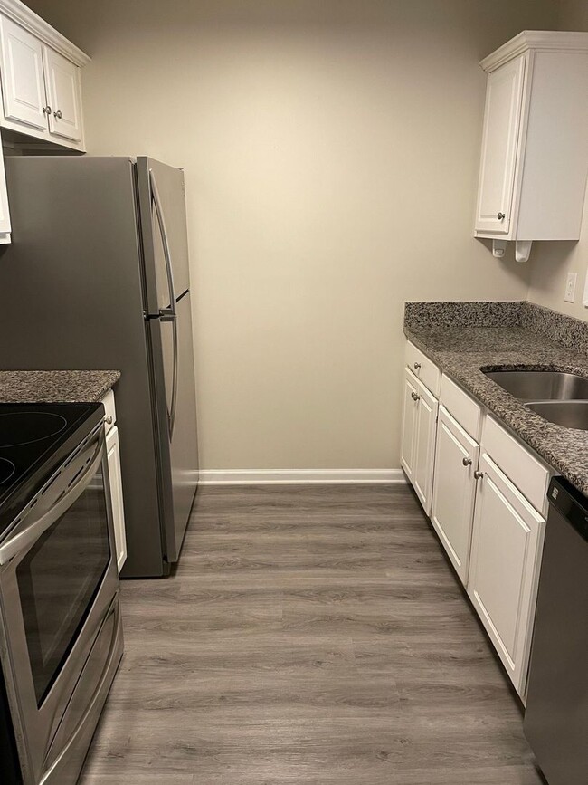 Building Photo - Harborview 2-Story Townhouse with Spacious Layout & Community Pool Access