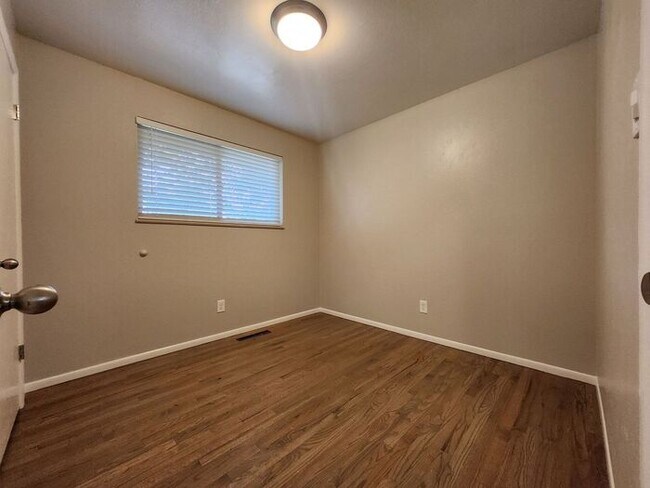 Building Photo - Move-In Ready 5-Bedroom Gem – Enjoy 50% Of...