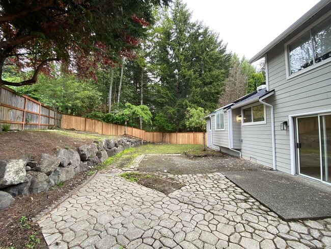Building Photo - Stylishly Renovated Home with Private Back...
