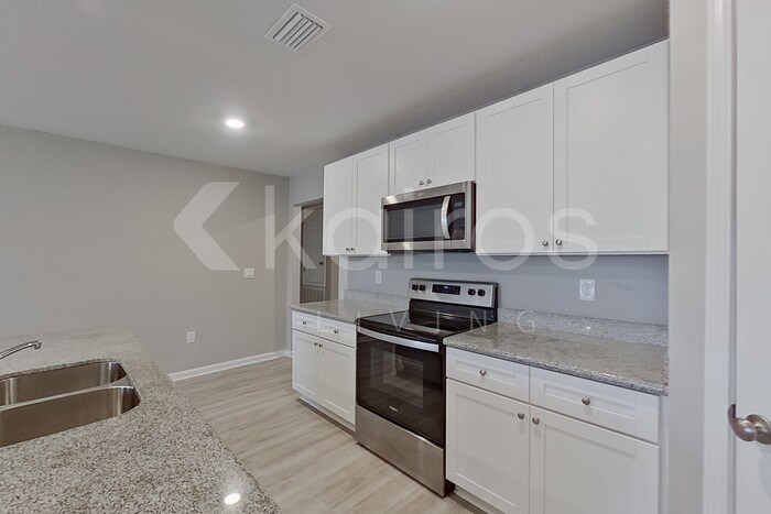 Building Photo - 4614 Malay Cir