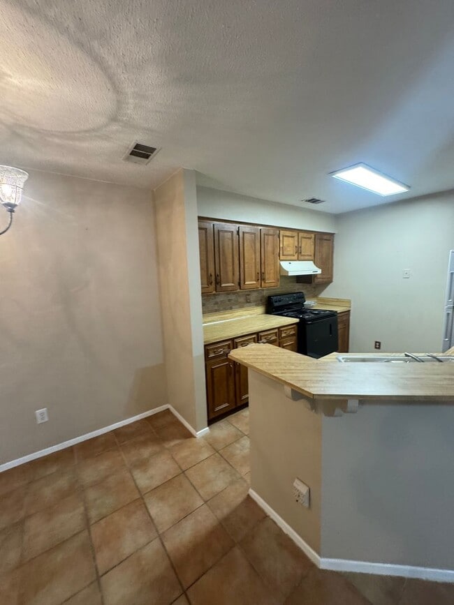 Building Photo - Corner Unit and One Level