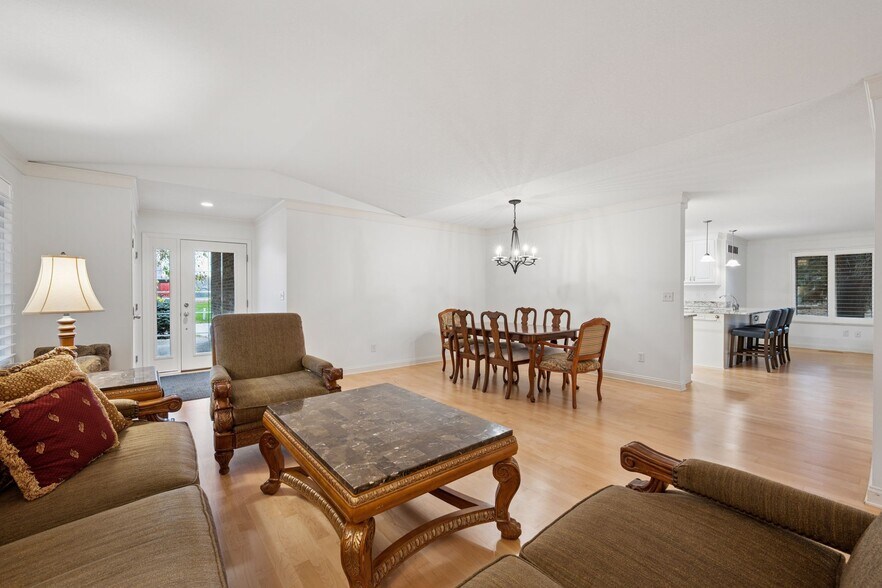 Great open-concept living, where the living and dining spaces flow seamlessly - 145 Holly Ln N