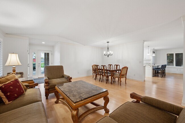 Great open-concept living, where the living and dining spaces flow seamlessly - 145 Holly Ln N