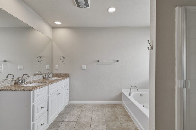 Building Photo - Gated Community Home with Solar Panels & All Appliances Included