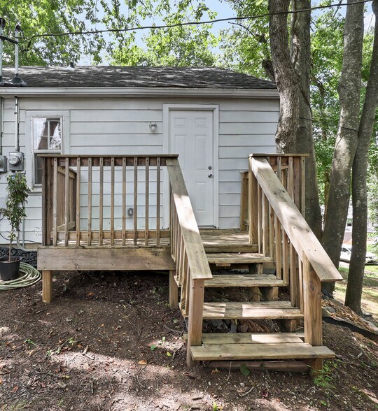 Private patio surrounded by woods. - 1 Proctor Dr