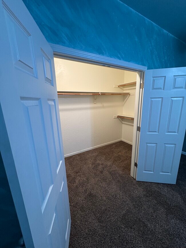 Main bedroom walk in closet - 13696 Daytona Ct