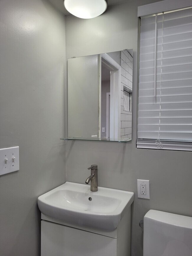 Building Photo - Remodeled 3 bedroom 2 bathroom house with 2 car garage and fenced yard