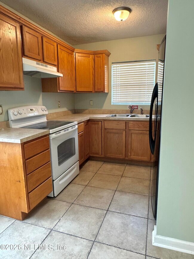 Building Photo - 5227 Bunche Dr