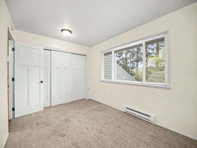 Building Photo - Spacious 2-Story Condo in a Quiet, Well-Located Community!