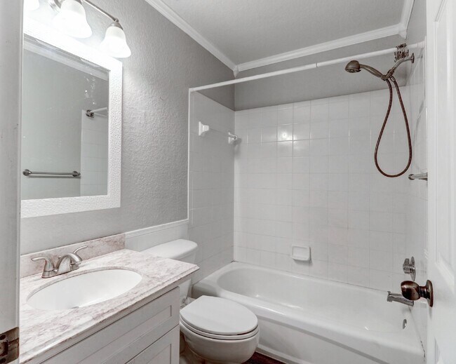 Building Photo - Gated Tampa Palms Townhome with 2-Car Garage, Screened Lanai & Community Pool