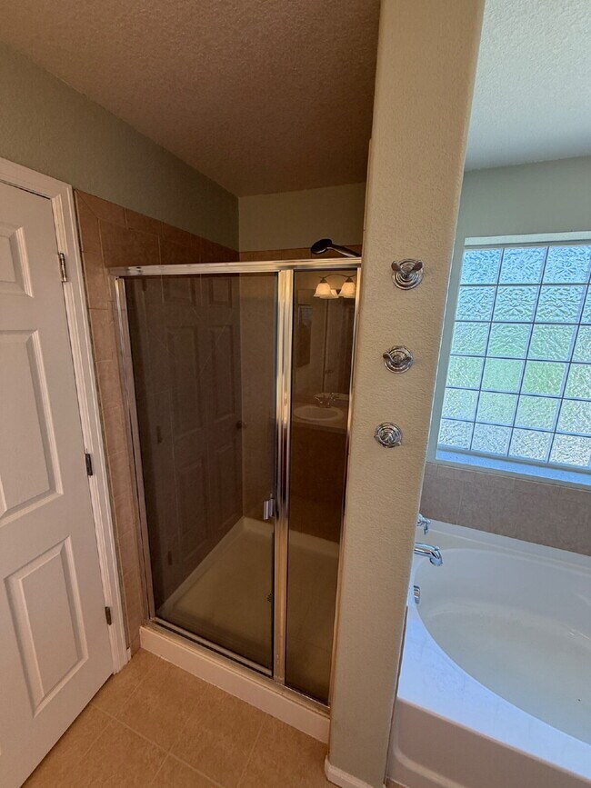 Building Photo - "Spacious 2-Bed Condo with 2.5 Baths in Aurora – Quiet Community in Aurora