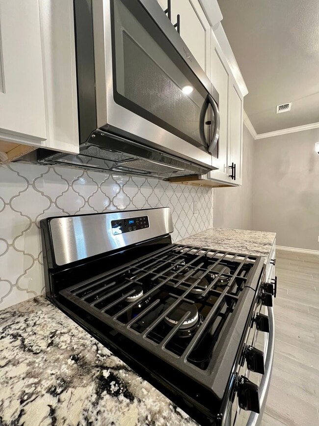 Building Photo - New Beginnings Start at AMRR: Gorgeous 3 Bedroom Townhome!