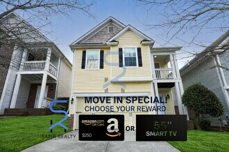 Building Photo - Move in before February 15th and choose your reward: a $250 Amazon Gift Card or a 55" Smart TV!