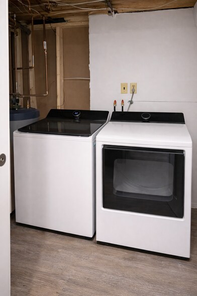 Shared in-unit laundry with brand-new washer and dryer - 16 Miller Rd