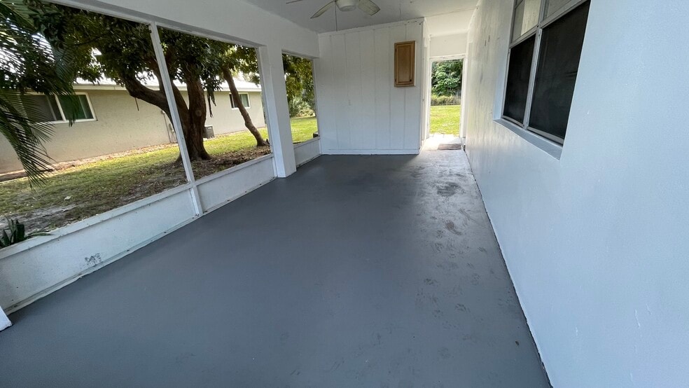 Carport to Rear with Laundry Room - 900 NW 10th Terrace