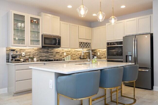 Building Photo - "Spacious 4-Bedroom Retreat with 3 Full Baths in Winter Garden's Serene Sanctuary"