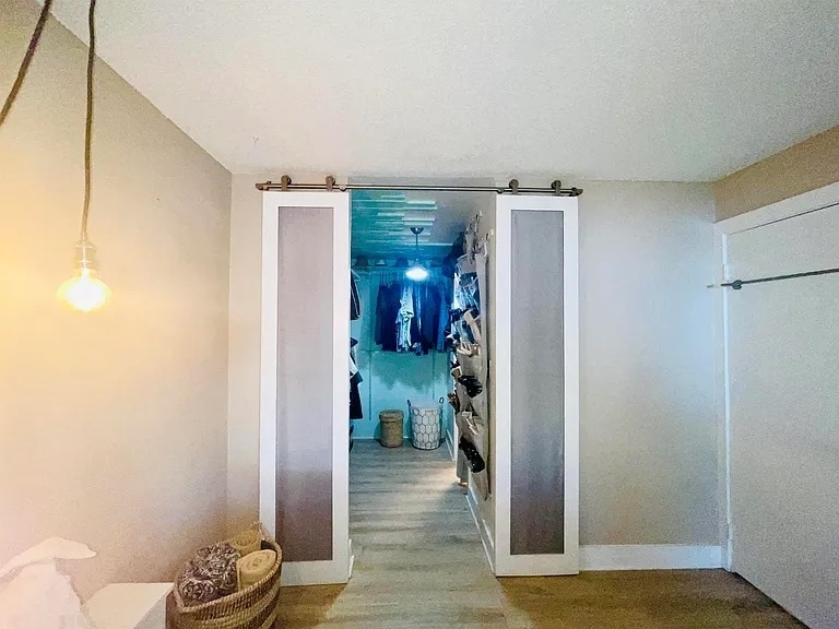 Walk in closet with lots of storage - 140 Uwapo Rd