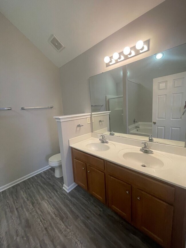 Building Photo - Come take a look at the gorgeous newly renovated 4 bedroom, 2.5 bath, 2 car garage home located i...