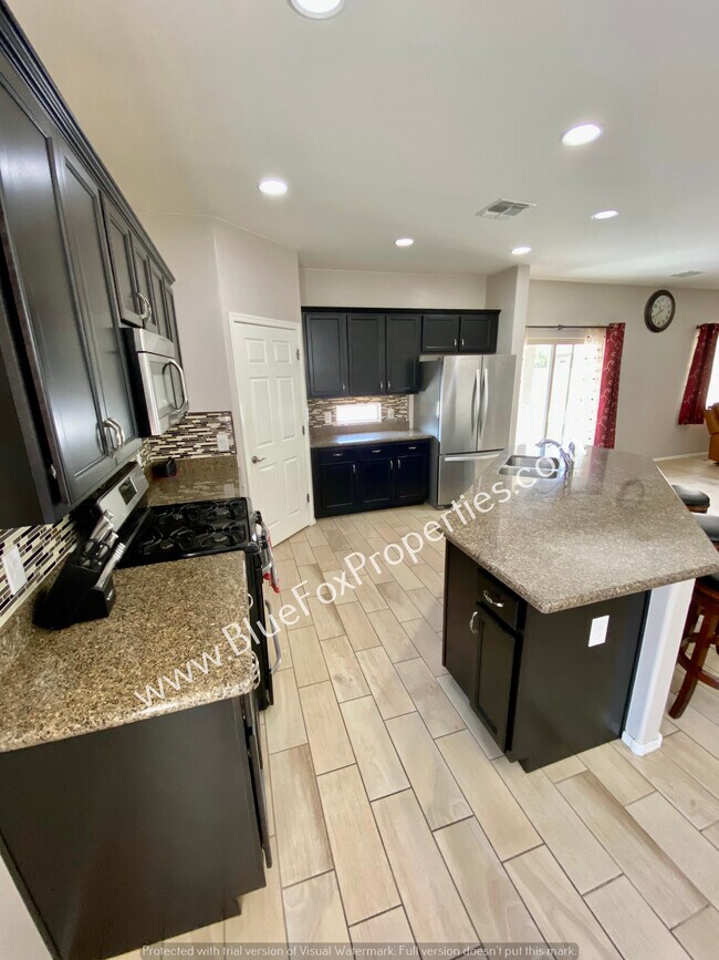 Building Photo - 9009 W Rolling Springs Dr