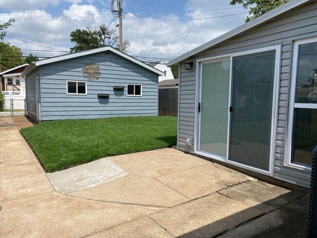 Building Photo - Newly Renovated Home with 2 Car garage in ...