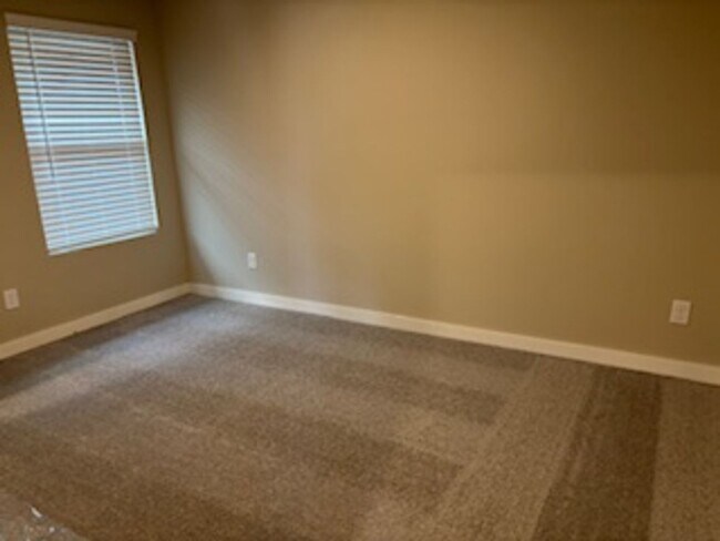 Building Photo - BRAND NEW HOME!  First month free!