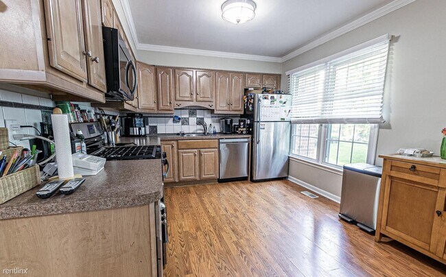 Building Photo - 4 br, 3.5 bath House - 4915 Carriagepark Rd