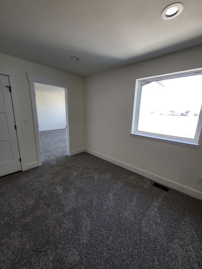 Building Photo - Beautiful New Construction!  3 Bedroom 2.5 Bath Townhome In Sweetgrass!!!!!