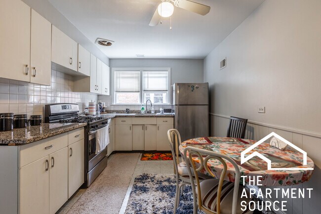 Building Photo - 9056 Lamon Ave