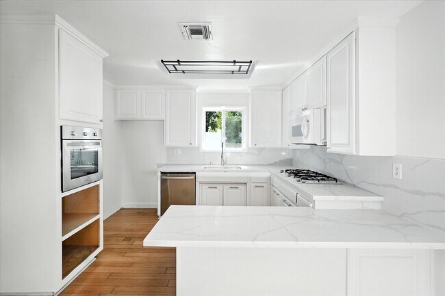 Building Photo - 8846 Laramie Ave