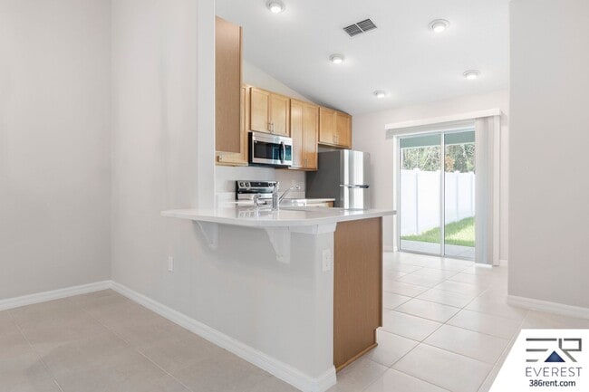 Building Photo - FULLY FENCED, LIKE NEW 3/2/1 TOWNHOUSE ON A CUL DE SAC IN BEAUTIFUL SEMINOLE WOODS