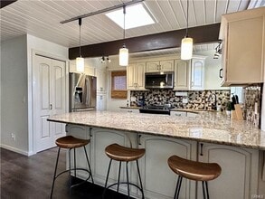 Building Photo - Fully furnished mid-century modern oasis located less than a mile