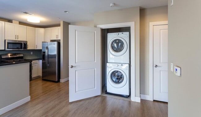 Each home is has in-unit stacked laundry - Axiom Apartments