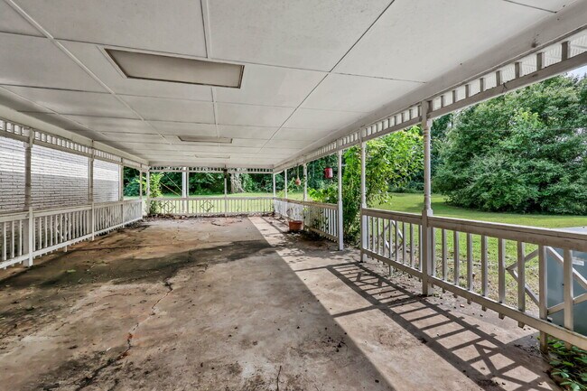 Building Photo - spacious 4-bedroom, 2.5-bath home featuring a 2-car garage and fresh updates throughout.