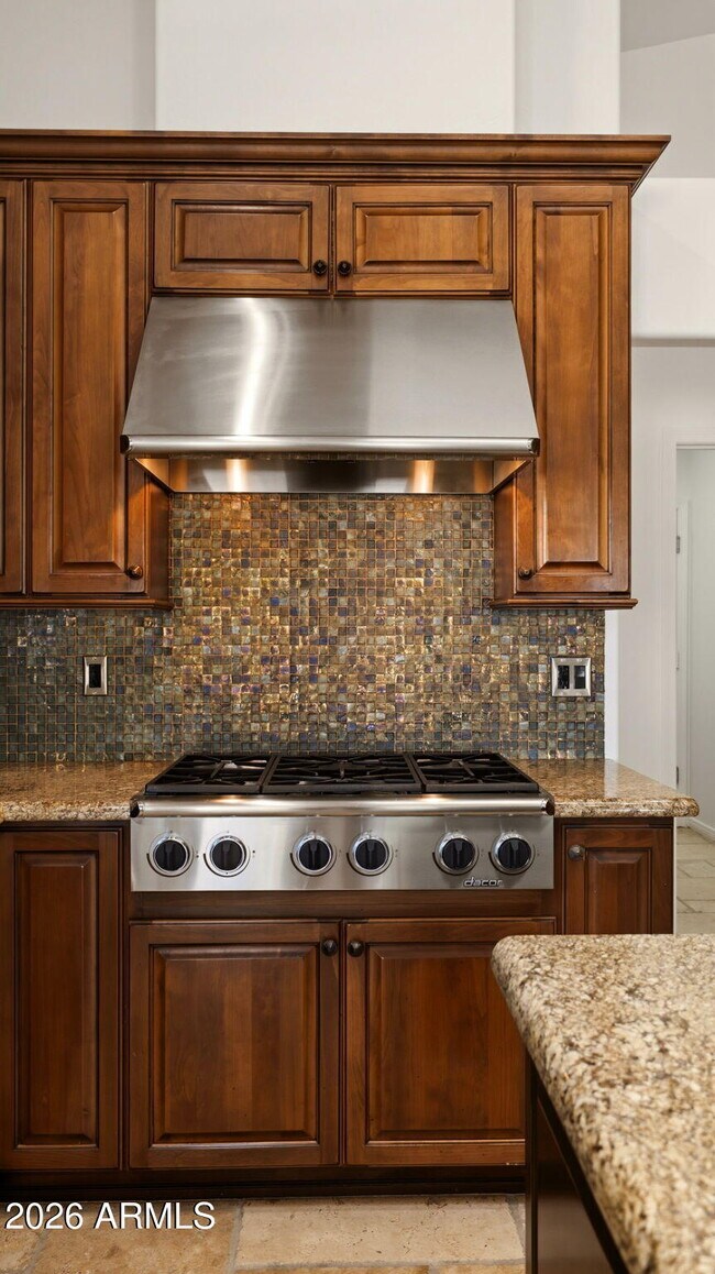 Building Photo - 8638 E Dahlia Dr