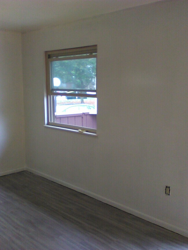 dining room with new flooring and new paint - 214 Brian Dr