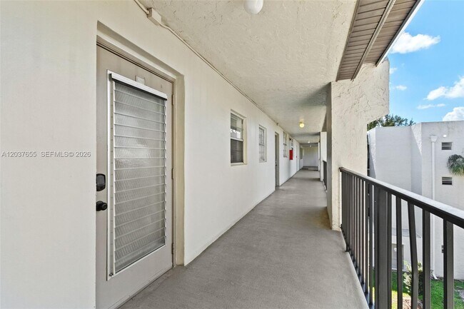 Building Photo - 9480 Poinciana Pl