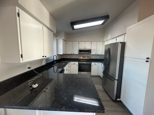 Building Photo - Quiet neighborhood, 3 bedroom, 2 bath home, huge front patio/deck, RV parking!